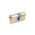Carlisle Brass Yale Platinum 3 Star Cylinder in brass finish, designed with a robust locking mechanism visible on one side, featuring a central color band and two key entry points.