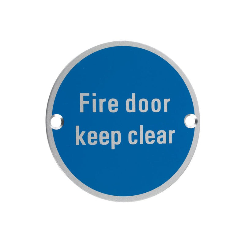 Zoo Hardware Signage - Fire Door Keep Clear, featuring a round blue aluminum sign with white lettering, indicating to keep the fire door clear for safety.