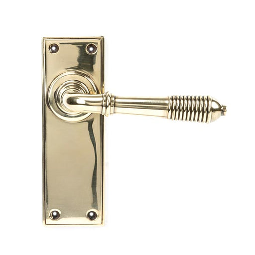Aged Brass Reeded Lever Latch Set.