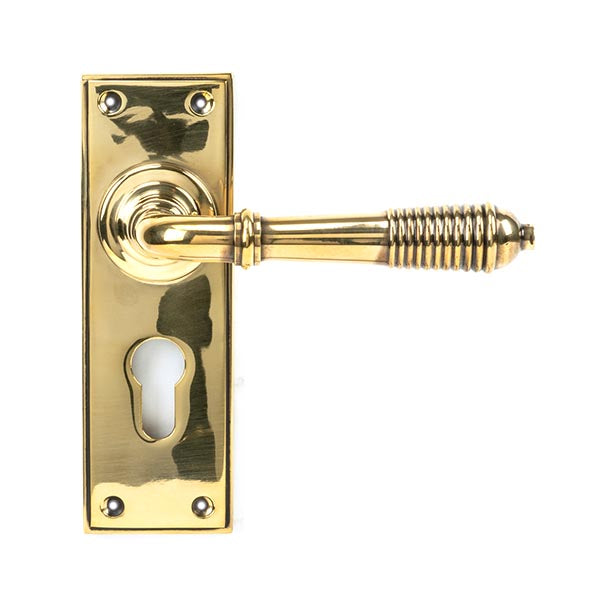 Aged Brass Reeded Lever Latch Set.