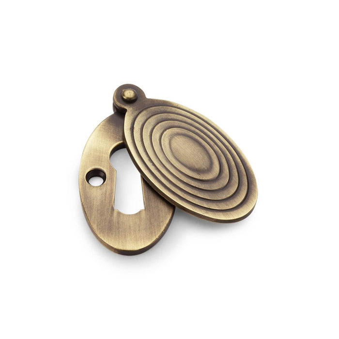 AW - Standard Key Profile Ellipse Escutcheon with Christoph Design Cover - Antique Brass